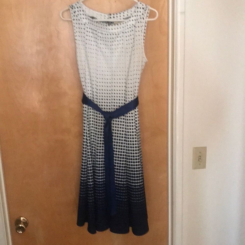 Sleeveless white and navy dress